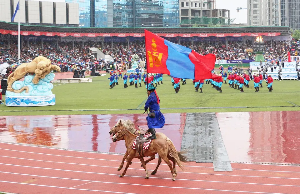 Ceremony performers on the stadium field at Naadam