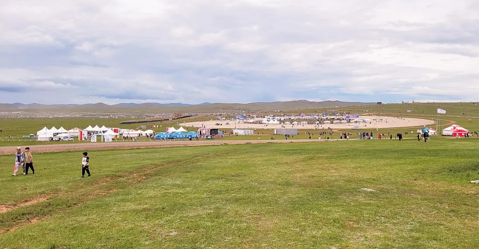 Crowds line the racecourse on the steppe at Khui Doloon Khudag